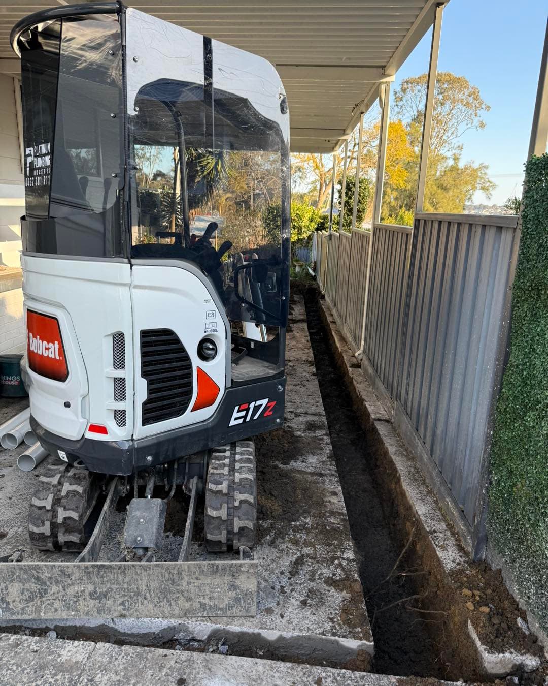 Bobcat E17z excavator on a Platinum Plumbing civil job